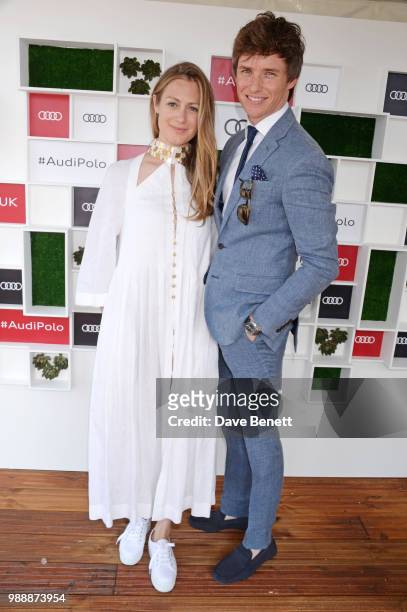 Hannah Redmayne and Eddie Redmayne attend the Audi Polo Challenge at Coworth Park Polo Club on July 1, 2018 in Ascot, England.