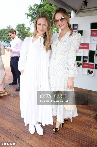 Hannah Redmayne and Lily James attend the Audi Polo Challenge at Coworth Park Polo Club on July 1, 2018 in Ascot, England.