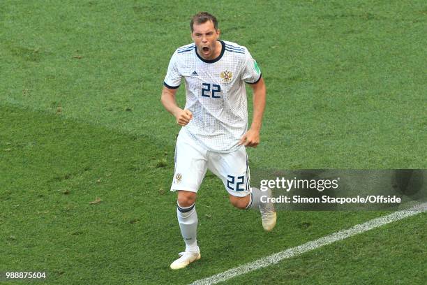 Artem Dzyuba of Russia celebrates scoring their 1st goal from the penalty spot during the 2018 FIFA World Cup Russia Round of 16 match between Spain...