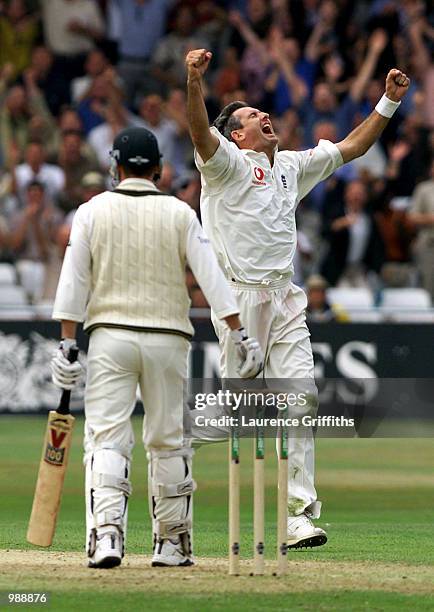 Andrew Caddick of England celebrates the wicket of Damien Martyn of Australia during the first day of the Npower Third Test match between England and...