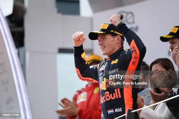 Race winner Max Verstappen of Netherlands and Red Bull Racing celebrates on the podium during the Formula One Grand Prix of Austria at Red Bull Ring...