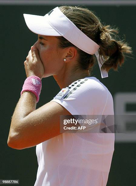 Anabel Garrigues of Spain reacts during their Estoril Open tennis match against Shuai Peng of China at Jamor Stadium, in Estoril, outskirts of...
