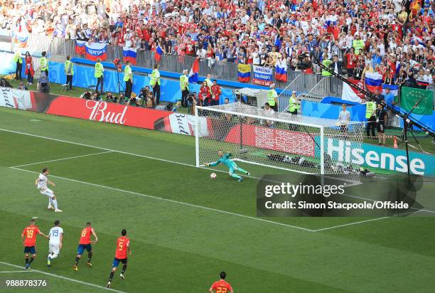 Artem Dzyuba of Russia scores their 1st goal from the penalty spot during the 2018 FIFA World Cup Russia Round of 16 match between Spain and Russia...