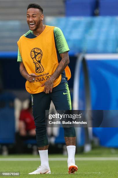 Neymar Jr smiles during a Brazil training session ahead of the Round 16 match against Mexico at Samara Arena on July 1, 2018 in Samara, Russia.