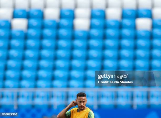 Neymar Jr looks on during a Brazil training session ahead of the Round 16 match against Mexico at Samara Arena on July 1, 2018 in Samara, Russia.