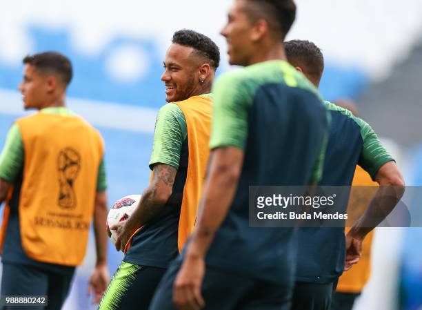 Neymar Jr smiles during a Brazil training session ahead of the Round 16 match against Mexico at Samara Arena on July 1, 2018 in Samara, Russia.