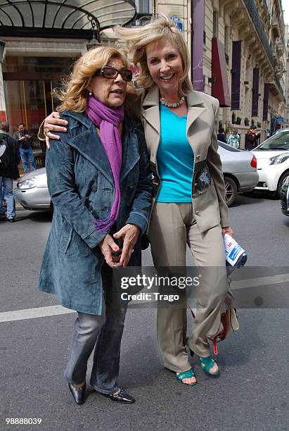 Nicoletta and Fabienne Amiach leave 'Les Salvadors de La Petanque' - Press Conference at Hotel Normandy on May 6, 2010 in Paris, France.