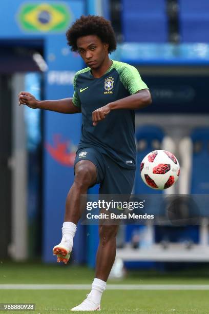Willian kicks the ball during a Brazil training session ahead of the Round 16 match against Mexico at Samara Arena on July 1, 2018 in Samara, Russia.