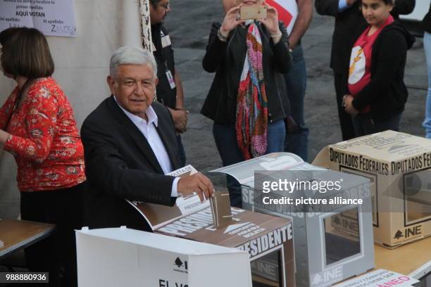 July 2018, Mexico, Mexiko City: Politician Andres Manuel Lopez Obrador, presidential candidate for the party Morena, casts his vote in the election....