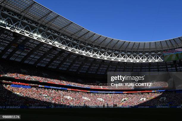 General view shows football fans in the grandstand during the Russia 2018 World Cup round of 16 football match between Spain and Russia at the...