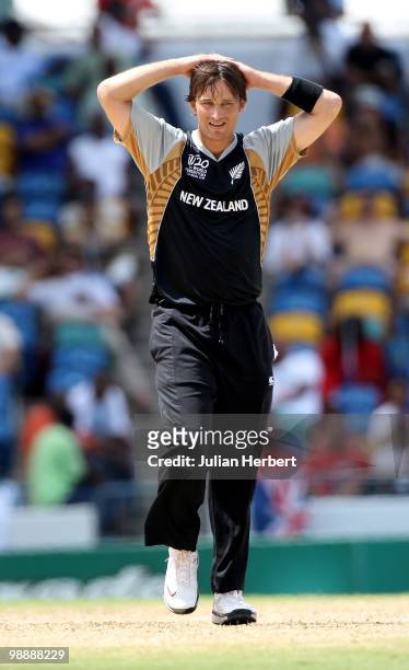 Shane Bond of New Zealand looks despondent as runs are scored of his bowling during The ICC World Twenty20 Super Eight match between South Africa and...