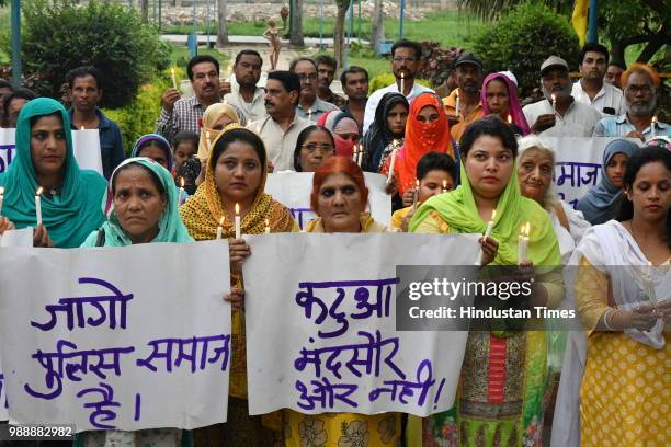 Muslim women take part in a protest against rape in Mandsaur and Kathua, on July 1, 2018 in Bhopal, India. The gang rape led to massive protests,...