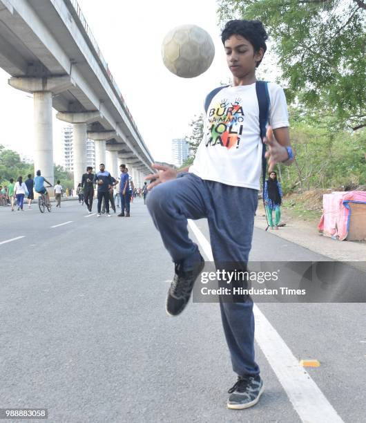 People seen engaged in activities conducted during a Raahgiri Day, an event organised by MCG at Sector 55 Golf Course Road, in Gurugram, India on...