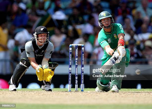Gareth Hopkins looks on as Herschelle Gibbs of South Africa scores runs during The ICC World Twenty20 Super Eight match between South Africa and New...