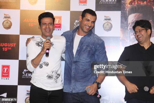 Bollywood actors John Abraham and Manoj Bajpayee during the trailer launch of a movie Satyamev Jayate at PVR ECS, Andheri, on June 28, 2018 in...