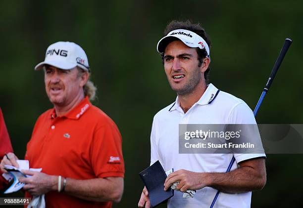 Edoardo Molinari of Italy with playing partner Miguel Angel Jimenez of Spain during the first round of the BMW Italian Open at Royal Park I Roveri on...