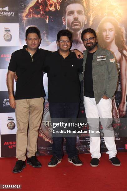 Producer Bhushan Kumar, Milap Zaveri and Nikkhil Advani during the trailer launch of a movie Satyamev Jayate at PVR ECS, Andheri, on June 28, 2018 in...