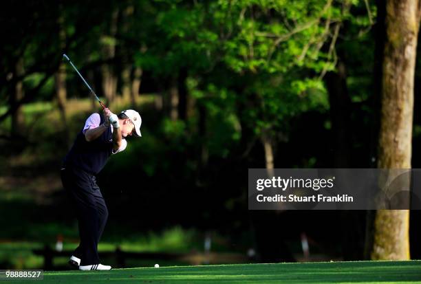 Paul Lawrie of Scotland plays his approach shot on the 11th hole during the first round of the BMW Italian Open at Royal Park I Roveri on May 6, 2010...