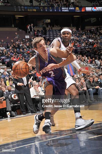 Goran Dragic of the Phoenix Suns drives the ball against the New Jersey Nets during the game on March 31, 2010 at the Izod Center in East Rutherford,...