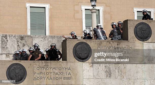 Greek riot police guard the Parliament buildings on May 6, 2010 in Athens, Greece. Three people, one of them a pregnant woman, were killed when...