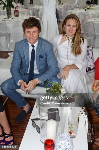 Eddie Redmayne and Hannah Redmayne attend the Audi Polo Challenge at Coworth Park Polo Club on July 1, 2018 in Ascot, England.