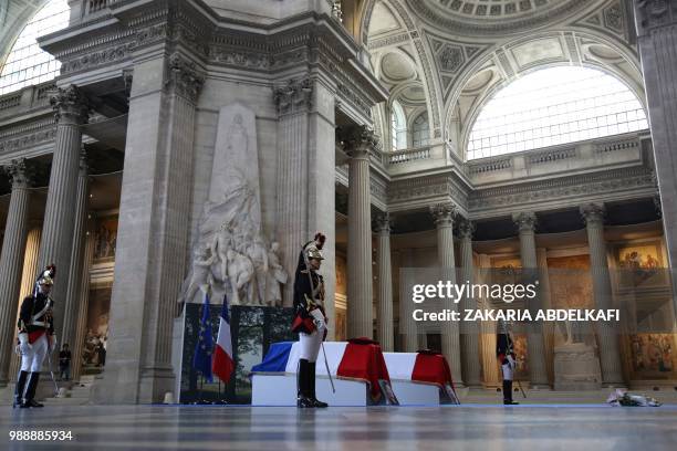 Republican Guards stand around the coffins of former French politician and Holocaust survivor Simone Veil and her husband Antoine Veil as visitor pay...