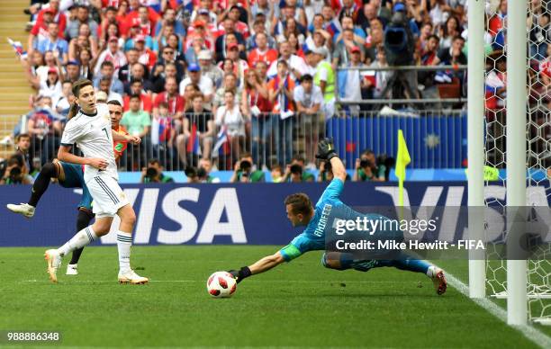 Igor Akinfeev of Russia saves an shot by Iago Aspas of Spain during the 2018 FIFA World Cup Russia Round of 16 match between Spain and Russia at...