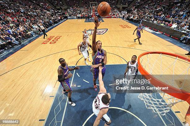 Channing Frye of the Phoenix Suns puts a shot up against the New Jersey Nets during the game on March 31, 2010 at the Izod Center in East Rutherford,...