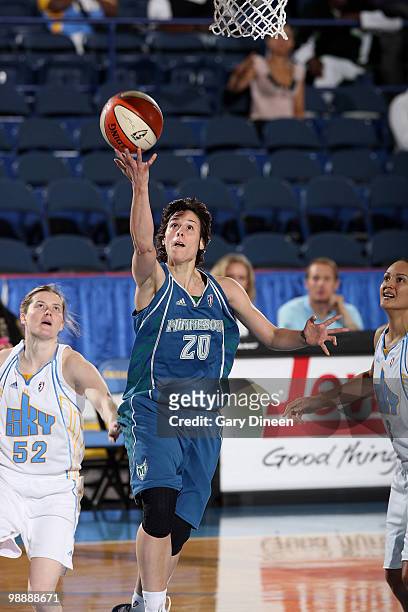 Nuria Martinez of the Minnesota Lynx goes to the basket past Sami Whitcomb of the Chicago Sky on May 6, 2010 at the All-State Arena in Rosemont,...