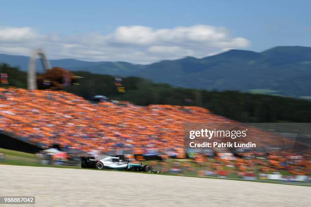 Lewis Hamilton of Great Britain driving the Mercedes AMG Petronas F1 Team Mercedes WO9 on track during the Formula One Grand Prix of Austria at Red...