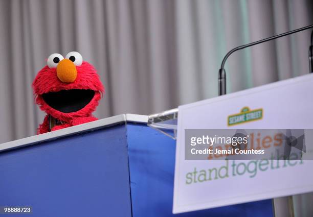 Sesame Street resident Elmo addresses the crowd at the screening of "Families Stand Together: Feeling Secure in Tough Times" at the Children's Aid...