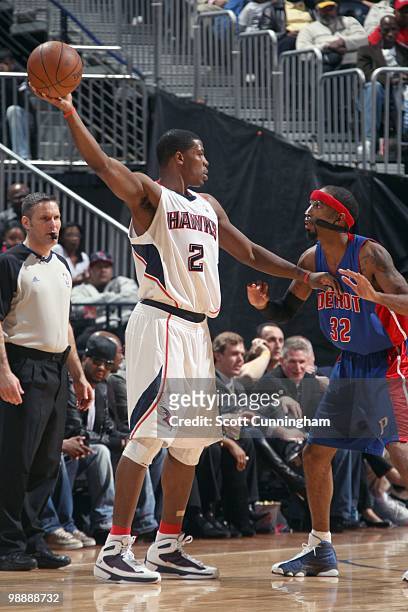 Joe Johnson of the Atlanta Hawks looks to move the ball against Richard Hamilton of the Detroit Pistons during the game on March 13, 2010 at Philips...