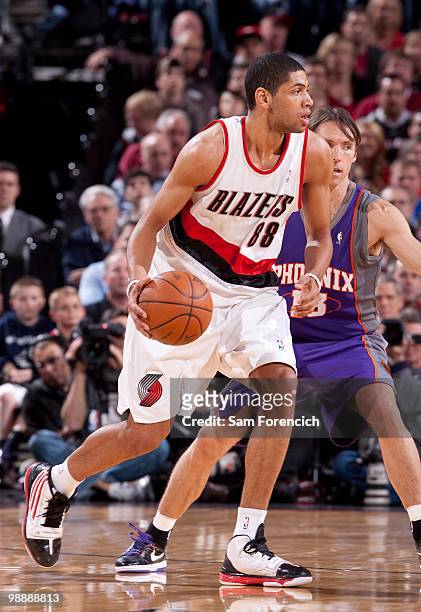 Nicolas Batum of the Portland Trail Blazers dribbles against Steve Nash of the Phoenix Suns in Game Six of the Western Conference Quarterfinals...