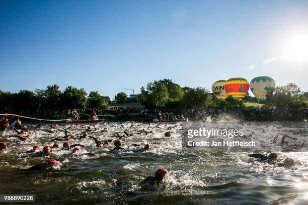Athletes compete during the swim leg at the DATEV Challenge Roth 2018 on July 1, 2018 in Roth, Germany.