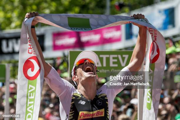 Sebastian Kienle of Germany reacts after winning the DATEV Challenge Roth 2018 on July 1, 2018 in Roth, Germany.