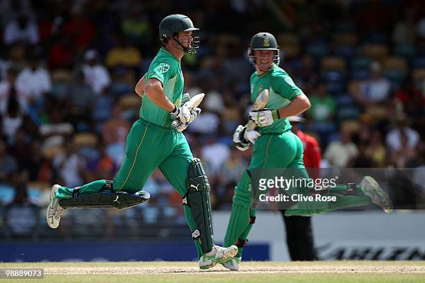 Albie Morkel and AB de Villiers of South Africa run between the wickets during The ICC World Twenty20 Super Eight match between South Africa and New...