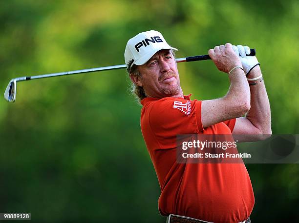 Miguel Angel Jimenez of Spain plays his tee shot on the 12th hole during the first round of the BMW Italian Open at Royal Park I Roveri on May 6,...