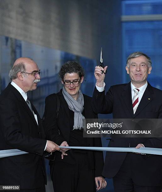 German President Horst Koehler poses before cutting the ribbon during the inauguration ceremony of the new "Topographie des Terrors" museum next to...