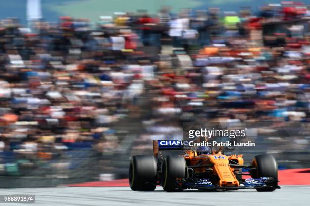 Fernando Alonso of Spain driving the McLaren F1 Team MCL33 Renault on track during the Formula One Grand Prix of Austria at Red Bull Ring on July 1,...