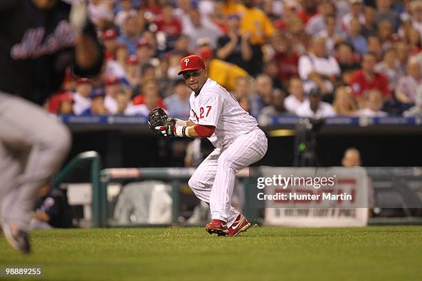 Third baseman Placido Polanco of the Philadelphia Phillies fields a ground ball during a game against the New York Mets at Citizens Bank Park on May...