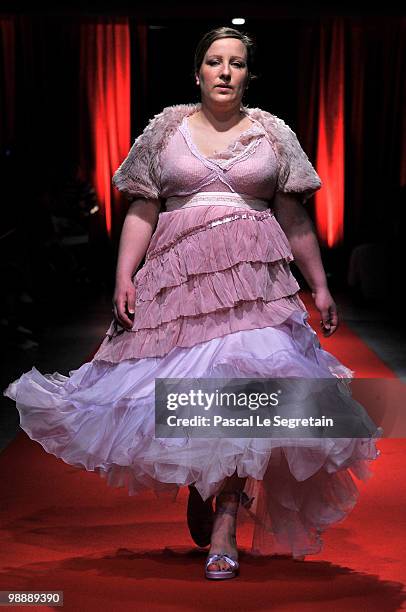 Model of the association "Tissons la Solidarite" walks down the runway at Docks en Seine on May 6, 2010 in Paris, France. Christian Lacroix sponsored...