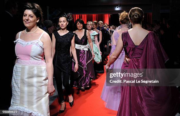 Models and designers of the association "Tissons la Solidarite" walk down the runway at Docks en Seine on May 6, 2010 in Paris, France. Chrsitian...