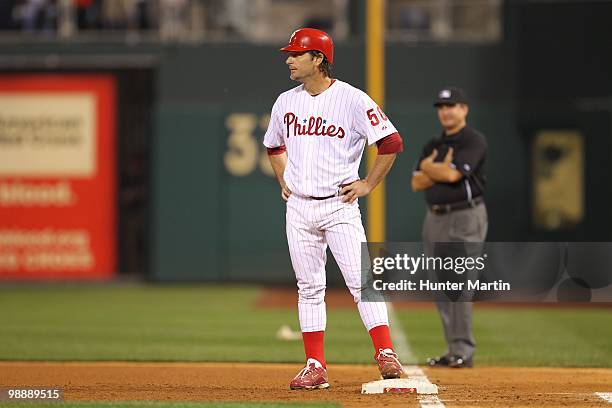 Starting pitcher Jamie Moyer of the Philadelphia Phillies stands on first base during a game against the New York Mets at Citizens Bank Park on May...