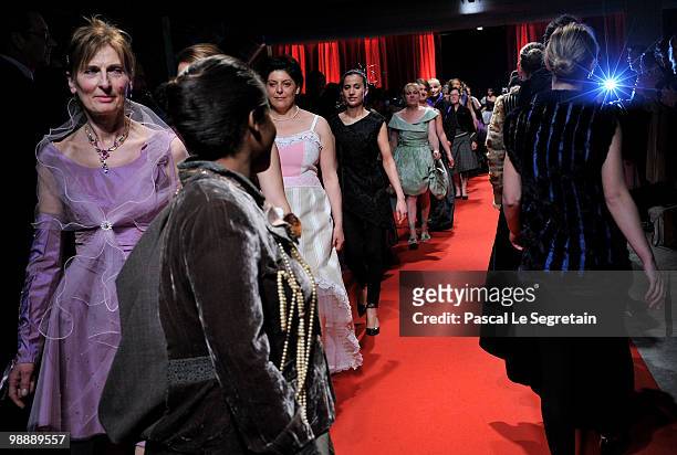 Models and designers of the association "Tissons la Solidarite" walk down the runway at Docks en Seine on May 6, 2010 in Paris, France. Chrsitian...