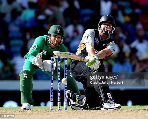 Mark Boucher of South Africa looks on as Jesse Ryder hits out during The ICC World Twenty20 Super Eight match between South Africa and New Zealand...