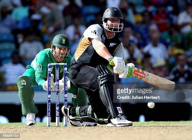Mark Boucher of South Africa looks on as Jesse Ryder hits out during The ICC World Twenty20 Super Eight match between South Africa and New Zealand...