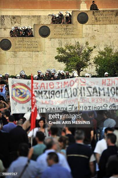 Demonstrators gather in front of the Greek Parliament, protected by Greek riot police, on May 6, 2010. More than 10,000 people demonstrated...