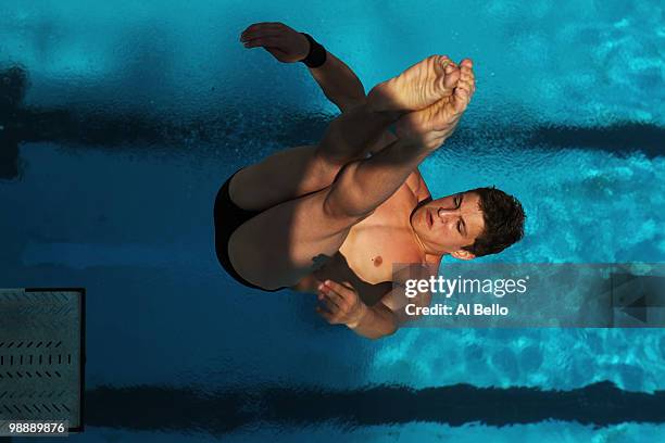 Kirill Sivintsev of Russia dives during the 3 meter preliminaries at the Fort Lauderdale Aquatic Center during Day 1 of the AT&T USA Diving Grand...