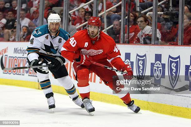 Henrik Zetterberg of the Detroit Red Wings skates against Rob Blake of the San Jose Sharks in Game Three of the Western Conference Semifinals during...