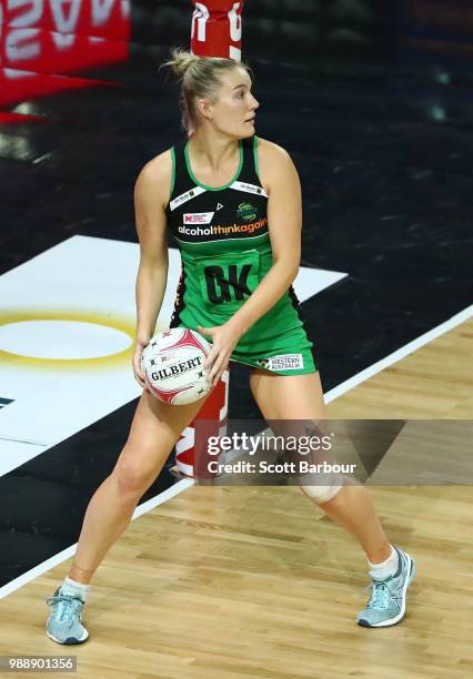 Courtney Bruce of the Fever competes for the ball during the round nine Super Netball match between the Magpies and the Fever at Margaret Court Arena...